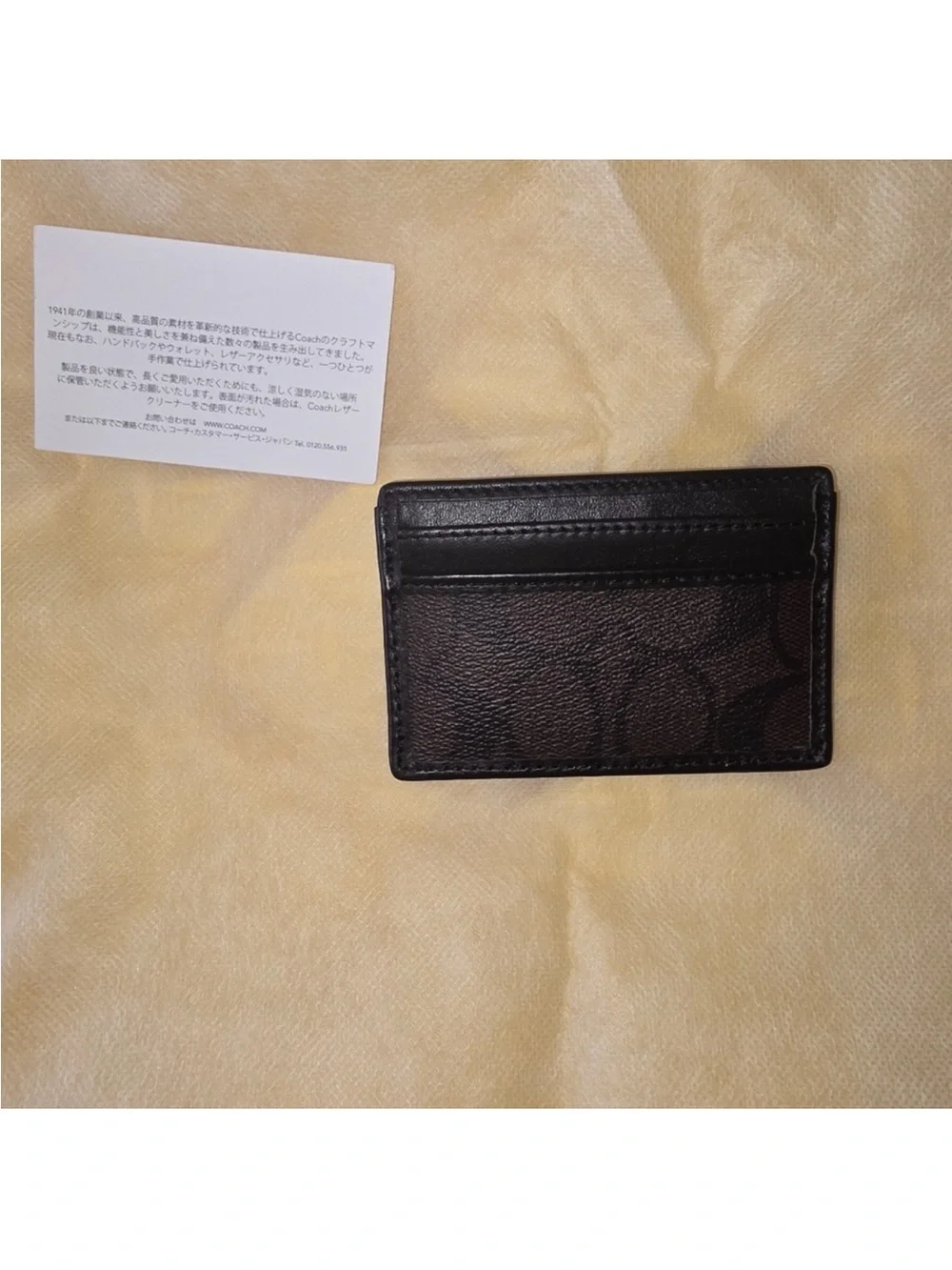 NWOT Coach Brown Leather Slim Card Holder With Care Card.